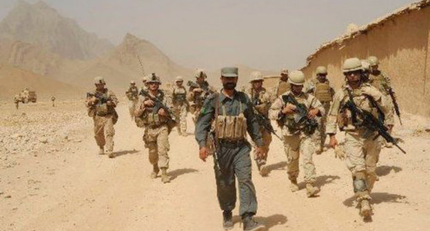 Georgian soldiers secure a village in the Helmand province, Afghanistan. 2010. http://en.wikipedia.org Georgian soldiers secure a village in the Helmand province, Afghanistan. 2010. http://en.wikipedia.org