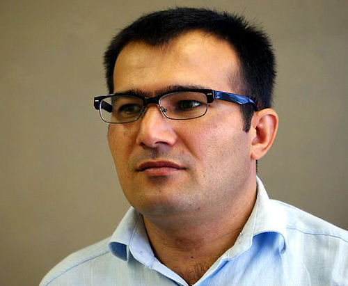 Seymur Haziyev, a columnist for the opposition "Azadliq" newspaper.
Photo: Azadliq Radiosu.az (RFE/RL) Seymur Haziyev, a columnist for the opposition "Azadliq" newspaper.
Photo: Azadliq Radiosu.az (RFE/RL)