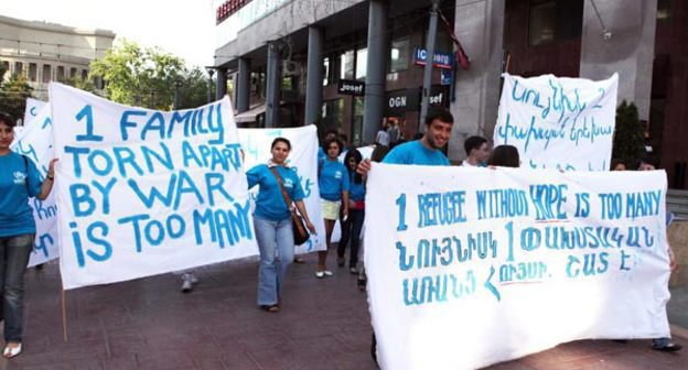 Armenian refugees from Azerbaijan march along streets with posters. Yerevan, June 20, 2011. Photo: Photolure Armenian refugees from Azerbaijan march along streets with posters. Yerevan, June 20, 2011. Photo: Photolure