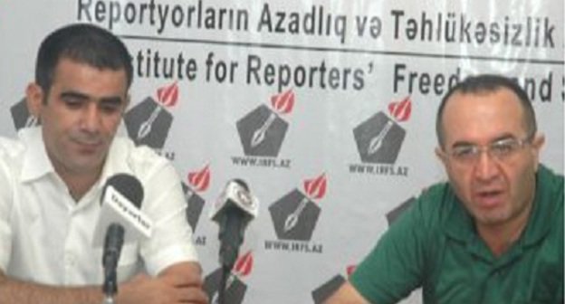 Rashid Gadjily, Director of the Institute of Media Rights (to the right) and his colleague Khalid Agaliev presenting the report on the situation with the freedom of media in the office of IMR. Baku, July 22, 2011. Photo by "Turan". Rashid Gadjily, Director of the Institute of Media Rights (to the right) and his colleague Khalid Agaliev presenting the report on the situation with the freedom of media in the office of IMR. Baku, July 22, 2011. Photo by "Turan".