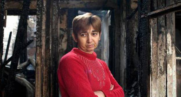 Siranush Sakunts, a resident of the burnt-down house in Koryun Street, amidst ashes. Yerevan, November 26, 2010. Photo: Nazik Armenakyan, Armenianow.com Siranush Sakunts, a resident of the burnt-down house in Koryun Street, amidst ashes. Yerevan, November 26, 2010. Photo: Nazik Armenakyan, Armenianow.com