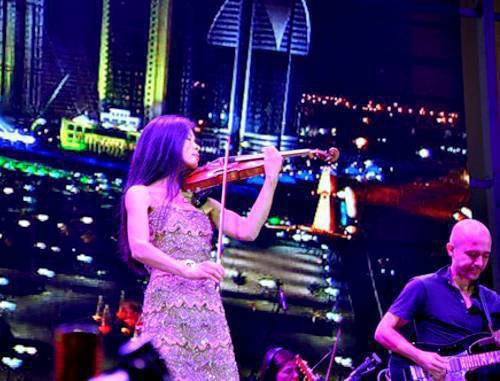 Vanessa Mae performing at celebrations of the Day of Grozny, October 5, 2011. Photo by Albert Tokaev Vanessa Mae performing at celebrations of the Day of Grozny, October 5, 2011. Photo by Albert Tokaev