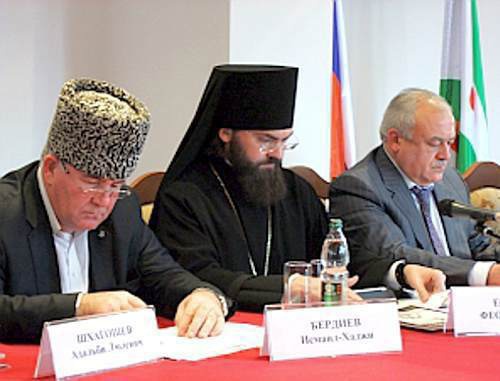 Participants of the third meeting of the members of the Public Council under the Plenipotentiary of Russian President in the North-Caucasian Federal District. Left to right: Mufti Ismail Berdiev, Bishop Theophylact, head of North Ossetia Taimuraz Mamsurov; Ingushetia, Djeirakh, October 21, 2011. Photo: http://skfo.gov.ru Participants of the third meeting of the members of the Public Council under the Plenipotentiary of Russian President in the North-Caucasian Federal District. Left to right: Mufti Ismail Berdiev, Bishop Theophylact, head of North Ossetia Taimuraz Mamsurov; Ingushetia, Djeirakh, October 21, 2011. Photo: http://skfo.gov.ru