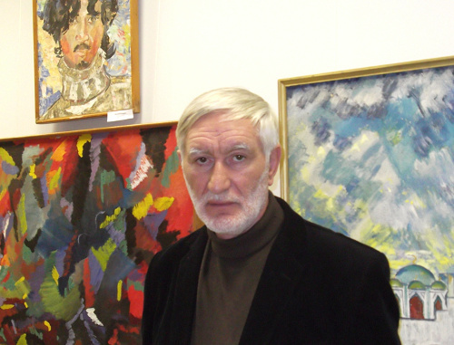 Exhibition of professional and amateur painters "Preodolenie" (Overcoming) within the Arts Festival of Repressed Nations. Daniyal Khadjiev, a corresponding member of the Peter's Academy of Arts and Sciences, near the paintings by Valery Kurdanov. The National Museum of the Republic of Kalmykia, Elista, November 19, 2011. Photo by Danara Churyumova for the "Caucasian Knot" Exhibition of professional and amateur painters "Preodolenie" (Overcoming) within the Arts Festival of Repressed Nations. Daniyal Khadjiev, a corresponding member of the Peter's Academy of Arts and Sciences, near the paintings by Valery Kurdanov. The National Museum of the Republic of Kalmykia, Elista, November 19, 2011. Photo by Danara Churyumova for the "Caucasian Knot"