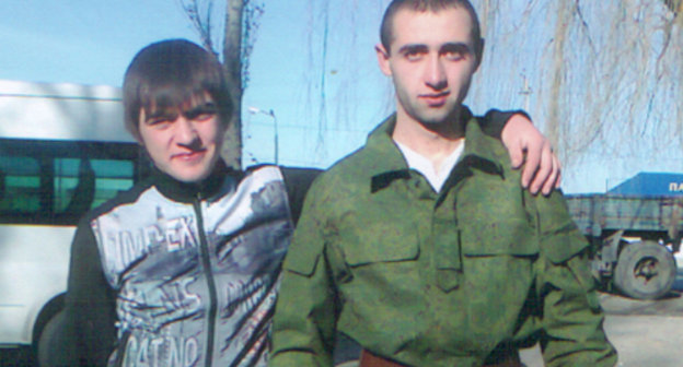 Taulan Gochiyaev (right) on departure to his military unit, December 2010. Photo from his family archive Taulan Gochiyaev (right) on departure to his military unit, December 2010. Photo from his family archive