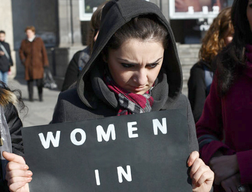 Participant of the action against gender violence "Women in Black", Yerevan, December 3, 2011. Photo by Varo Rafaelyan, www.panarmenian.net
Participant of the action against gender violence "Women in Black", Yerevan, December 3, 2011. Photo by Varo Rafaelyan, www.panarmenian.net