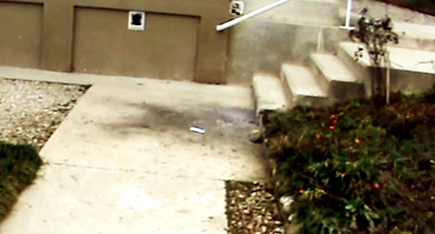 Place where a grenade exploded near the "Hall of the Kingdom" of Jehovah's Witnesses in Gudauta, March 24, 2012. Courtesy of the press service of the Administrative Center of Jehovah's Witnesses in Russia Place where a grenade exploded near the "Hall of the Kingdom" of Jehovah's Witnesses in Gudauta, March 24, 2012. Courtesy of the press service of the Administrative Center of Jehovah's Witnesses in Russia