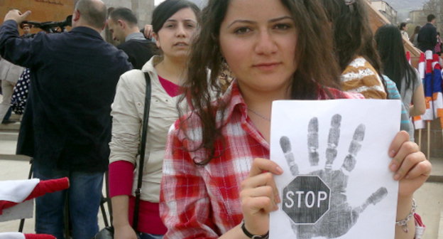 Nagorno-Karabakh, Stepanakert, April 9, 2012, a participant of the march dedicated to the 20th anniversary of tragic events in the village of Maraga. Photo by Alvard Grigoryan for the "Caucasian Knot" Nagorno-Karabakh, Stepanakert, April 9, 2012, a participant of the march dedicated to the 20th anniversary of tragic events in the village of Maraga. Photo by Alvard Grigoryan for the "Caucasian Knot"