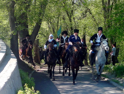 Participants of equestrian march ascend to the Stela of Nations' Friendship on the Day of Circassian Flag, Karachay-Cherkessia, April 25, 2012. Photo by Svetlana Nosova for the "Caucasian Knot" Participants of equestrian march ascend to the Stela of Nations' Friendship on the Day of Circassian Flag, Karachay-Cherkessia, April 25, 2012. Photo by Svetlana Nosova for the "Caucasian Knot"