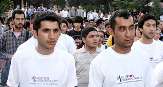 Azerbaijan, Baku, May 23, 2012, participants of the walk-protest in white T-shirts with inscription "Sing for Democracy". Photo by the IA "Turan" Azerbaijan, Baku, May 23, 2012, participants of the walk-protest in white T-shirts with inscription "Sing for Democracy". Photo by the IA "Turan"