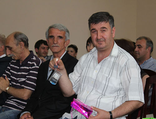 Repatriate from Turkey with keys to a new flat, Abkhazia, Sukhumi, May 30, 2012. Photo by Angela Kuchuberiya for the "Caucasian Knot" Repatriate from Turkey with keys to a new flat, Abkhazia, Sukhumi, May 30, 2012. Photo by Angela Kuchuberiya for the "Caucasian Knot"