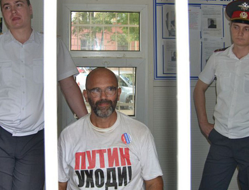 Detained activist Victor Chirikov (center) at a stationary police station in Krasnodar, June 12, 2012. Courtesy of http://vk.com/otkroy_glaza_kuban Detained activist Victor Chirikov (center) at a stationary police station in Krasnodar, June 12, 2012. Courtesy of http://vk.com/otkroy_glaza_kuban