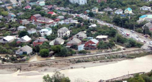 Top view of the flooded village of Novomikhailovsky, Tuapse District of the Krasnodar Territory, August 22, 2012. Courtesy of the press service of the Department for Krasnodar Territory of the Russian Ministry for Emergencies, www.23.mchs.gov.ru Top view of the flooded village of Novomikhailovsky, Tuapse District of the Krasnodar Territory, August 22, 2012. Courtesy of the press service of the Department for Krasnodar Territory of the Russian Ministry for Emergencies, www.23.mchs.gov.ru