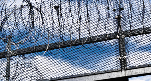 Prison fence. Courtesy of http://www.flickr.com/photos/x1klima/7637108374 Prison fence. Courtesy of http://www.flickr.com/photos/x1klima/7637108374