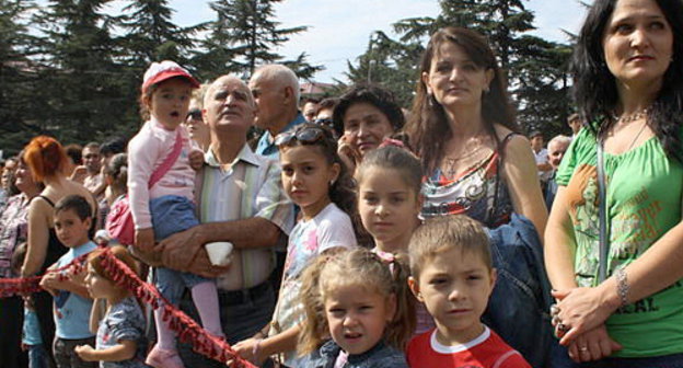 South Ossetia celebrates its Republic's Day. Tskhinvali residents at a military parade, September 20, 2012. Photo by Ekaterina Pukhaeva, IA "Res", http://cominf.org South Ossetia celebrates its Republic's Day. Tskhinvali residents at a military parade, September 20, 2012. Photo by Ekaterina Pukhaeva, IA "Res", http://cominf.org