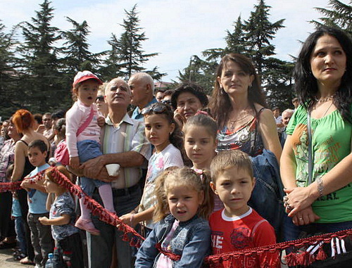 South Ossetia celebrates its Republic's Day. Tskhinvali residents at a military parade, September 20, 2012. Photo by Ekaterina Pukhaeva, IA "Res", http://cominf.org South Ossetia celebrates its Republic's Day. Tskhinvali residents at a military parade, September 20, 2012. Photo by Ekaterina Pukhaeva, IA "Res", http://cominf.org