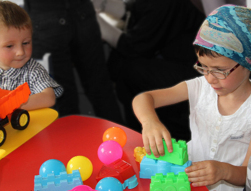 Children in kindergarten of Itum-Kali, Chechnya, 2012. Photo from http://itum-kali.com Children in kindergarten of Itum-Kali, Chechnya, 2012. Photo from http://itum-kali.com