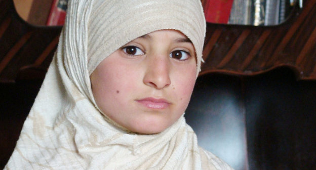 A girl wearing hijab. Photo by Raduan, http://www.flickr.com/photos/alsalam/2331475141 A girl wearing hijab. Photo by Raduan, http://www.flickr.com/photos/alsalam/2331475141