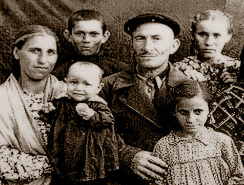 Dalkhat Lokmanovich Kholaev in exile with his family in the Jalalabad Rgion, Kyrgyz SSR. Photo frpm the fund of the Memorial Museum of Repressions and Genocide of Balkar People in 1944-57: http://www.gulagmuseum.org Dalkhat Lokmanovich Kholaev in exile with his family in the Jalalabad Rgion, Kyrgyz SSR. Photo frpm the fund of the Memorial Museum of Repressions and Genocide of Balkar People in 1944-57: http://www.gulagmuseum.org