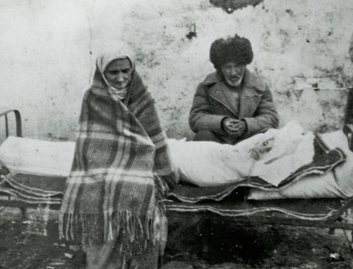 Forced migrants Avdarkhan Cazdiev and his wife Luli Gazdieva (Esieva) with their dead daughter Madina, Kazakhstan, 1946. Photo from http://old.ingushetiyaru.org Forced migrants Avdarkhan Cazdiev and his wife Luli Gazdieva (Esieva) with their dead daughter Madina, Kazakhstan, 1946. Photo from http://old.ingushetiyaru.org