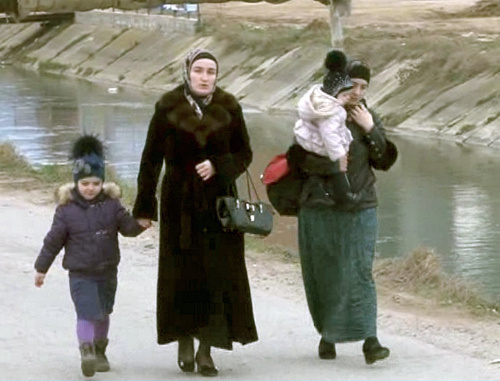 Women and children leave the CTO zone, Makhachkala, township of Semender, March 20, 2013. Still from the video posted on the website of the MIA of Dagestan, http://05.mvd.ru Women and children leave the CTO zone, Makhachkala, township of Semender, March 20, 2013. Still from the video posted on the website of the MIA of Dagestan, http://05.mvd.ru