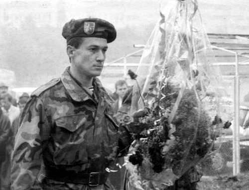 Abkhazian volunteers laying flowers at the boulder set in honour of the casualties victims of the 1992-1993 Georgian-Abkhaz conflict; Nalchik, Abkhazian Square, 1996, Courtesy of the magazine "Archives and Society", No. 18 Abkhazian volunteers laying flowers at the boulder set in honour of the casualties victims of the 1992-1993 Georgian-Abkhaz conflict; Nalchik, Abkhazian Square, 1996, Courtesy of the magazine "Archives and Society", No. 18