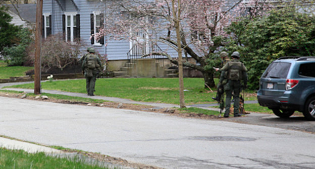 New Hampshire State troopers canvas a neighborhood in Watertown, Mass., April 19, 2013. Photo: Sally Vargas, Talk Radio News Service, http://www.flickr.com/photos/talkradionews/8664228538 New Hampshire State troopers canvas a neighborhood in Watertown, Mass., April 19, 2013. Photo: Sally Vargas, Talk Radio News Service, http://www.flickr.com/photos/talkradionews/8664228538