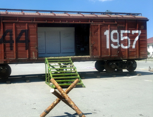 Cattle wagon with dates of deportation and return of Chechens to homeland installed in the Memorial Complex "Alley of Glory", Grozny, April 10, 2013. Photo of the "Caucasian Knot" Cattle wagon with dates of deportation and return of Chechens to homeland installed in the Memorial Complex "Alley of Glory", Grozny, April 10, 2013. Photo of the "Caucasian Knot"