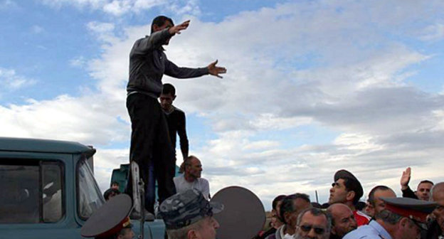 Armenia, May 13, 2013: farmers from the Armavir Region block the highway Armavir-Margara demanding compensation of damage caused by a heavy hail. Courtesy of the http://www.aysor.am Armenia, May 13, 2013: farmers from the Armavir Region block the highway Armavir-Margara demanding compensation of damage caused by a heavy hail. Courtesy of the http://www.aysor.am