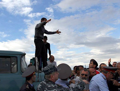 Armenia, May 13, 2013: farmers from the Armavir Region block the highway Armavir-Margara demanding compensation of damage caused by a heavy hail. Courtesy of the http://www.aysor.am Armenia, May 13, 2013: farmers from the Armavir Region block the highway Armavir-Margara demanding compensation of damage caused by a heavy hail. Courtesy of the http://www.aysor.am