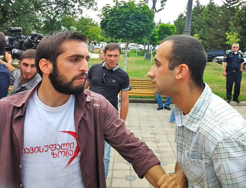 Activists of the NGO "Free Zone" Georgy Rukhaya (to the right) and Irakly Kvirtskhiya in the demonstration against actions of Russian border guards on the border with South Ossetia. Tbilisi, June 7, 2013. Photo by Beslan Kmuzov for the "Caucasian Knot". Activists of the NGO "Free Zone" Georgy Rukhaya (to the right) and Irakly Kvirtskhiya in the demonstration against actions of Russian border guards on the border with South Ossetia. Tbilisi, June 7, 2013. Photo by Beslan Kmuzov for the "Caucasian Knot".