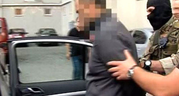 Detention of the accused of illegal acquisition and storage of weapons. Tbilisi, June 13, 2013. Shot from operational footage by Georgia's MIA Detention of the accused of illegal acquisition and storage of weapons. Tbilisi, June 13, 2013. Shot from operational footage by Georgia's MIA