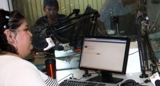 Khadidzha Ismailova at the Radio Liberty – Radio Free Europe live broadcasting for Azerbaijan. Photo by Turkhan Kerimov (RFE/RL). Khadidzha Ismailova at the Radio Liberty – Radio Free Europe live broadcasting for Azerbaijan. Photo by Turkhan Kerimov (RFE/RL).