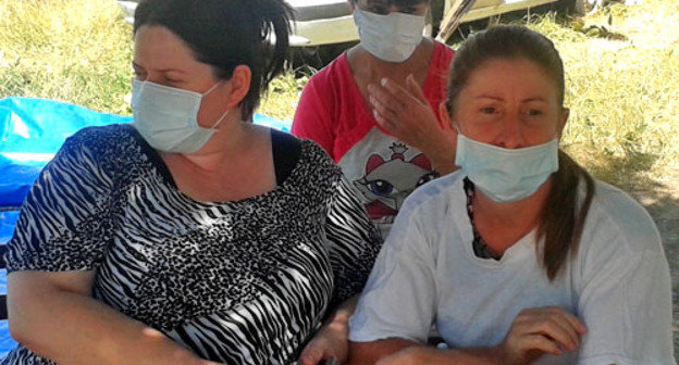 Residents of TAC "Promzhilbaza" in Ingushetia go on endless hunger strike. Karabulak, 1 july 2013. Photo courtesy of hunger-strikers Residents of TAC "Promzhilbaza" in Ingushetia go on endless hunger strike. Karabulak, 1 july 2013. Photo courtesy of hunger-strikers