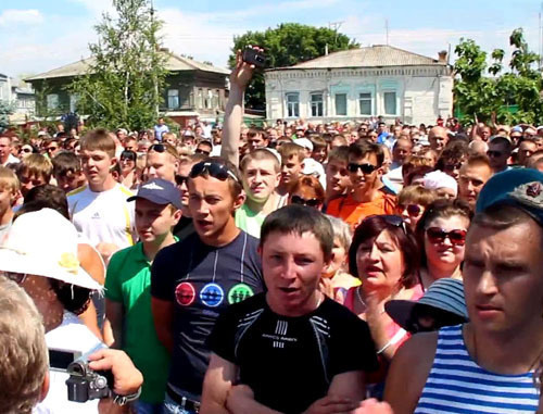 Pugachov residents demand to deport natives of Northern Caucasus at the protest action. Saratov region, July 8, 2013. Photo: shot from the video published at YouTube by user FreeNews Volga Pugachov residents demand to deport natives of Northern Caucasus at the protest action. Saratov region, July 8, 2013. Photo: shot from the video published at YouTube by user FreeNews Volga