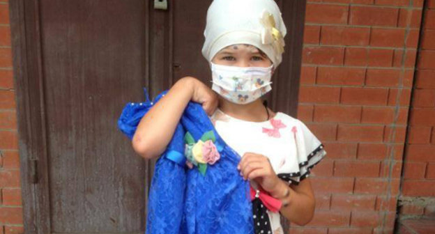 One of the participants of the the campaign "Dress a child for the holiday" with her new dress. Ingushetia, July 10, 2013. Photo from the page of the Charitable Foundation "Hearts Without Borders" on Facebook One of the participants of the the campaign "Dress a child for the holiday" with her new dress. Ingushetia, July 10, 2013. Photo from the page of the Charitable Foundation "Hearts Without Borders" on Facebook