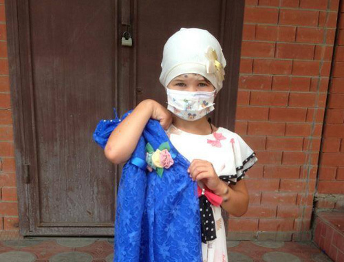 One of the participants of the the campaign "Dress a child for the holiday" with her new dress. Ingushetia, July 10, 2013. Photo from the page of the Charitable Foundation "Hearts Without Borders" on Facebook One of the participants of the the campaign "Dress a child for the holiday" with her new dress. Ingushetia, July 10, 2013. Photo from the page of the Charitable Foundation "Hearts Without Borders" on Facebook