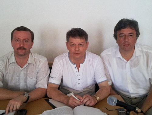 The head of administration of the Tsentralny District of Sochi Sergey Pavlenko (to the right) with his advocates in the courtroom of the Court of the Tsentralny District of Sochi. July 9, 2013. Photo by Svetlana Kravchenko for the "Caucasian Knot" The head of administration of the Tsentralny District of Sochi Sergey Pavlenko (to the right) with his advocates in the courtroom of the Court of the Tsentralny District of Sochi. July 9, 2013. Photo by Svetlana Kravchenko for the "Caucasian Knot"