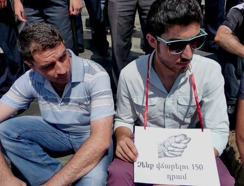 Protest against increase of public transport fares. The sign says: "We won't pay 150 drams!" Yerevan, July 19, 2013. Photo by Armine Martirosyan for the ‘Caucasian Knot’. Protest against increase of public transport fares. The sign says: "We won't pay 150 drams!" Yerevan, July 19, 2013. Photo by Armine Martirosyan for the ‘Caucasian Knot’.