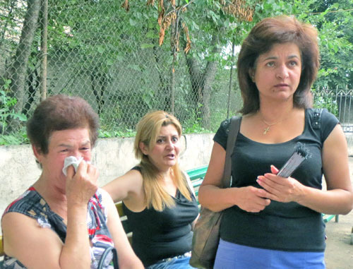 Goar Mnatsakanyan, mother of David Barsegyan (to the right), after her son had been found guilty, Nagorno-Karabakh, Stepanakert. July 23, 2013. Photo by Alvard Grigoryan for the “Caucasian Knot”. Goar Mnatsakanyan, mother of David Barsegyan (to the right), after her son had been found guilty, Nagorno-Karabakh, Stepanakert. July 23, 2013. Photo by Alvard Grigoryan for the “Caucasian Knot”.