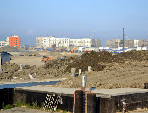 Construction of Olympic facilities, behind is an apartment complex “Sochnoe”. Sochi, July 2013. Photo by Svetlana Kravchenko for the “Caucasian Knot”. Construction of Olympic facilities, behind is an apartment complex “Sochnoe”. Sochi, July 2013. Photo by Svetlana Kravchenko for the “Caucasian Knot”.