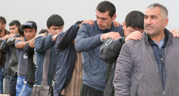The detained in connection with the incident at the "Matveevsky" Marketplace, July, 2013. Photo http://petrovka38.ru/ The detained in connection with the incident at the "Matveevsky" Marketplace, July, 2013. Photo http://petrovka38.ru/