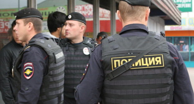 Police makes an inspection of the marketplace in the south-west of Moscow after the incident in the Matveevsky Marketplace. July 30, 2013. Photo: press group of Department of Internal Affairs of Southwestern Administrative District, http://petrovka38.ru/ Police makes an inspection of the marketplace in the south-west of Moscow after the incident in the Matveevsky Marketplace. July 30, 2013. Photo: press group of Department of Internal Affairs of Southwestern Administrative District, http://petrovka38.ru/