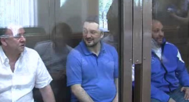 Suspects in the murder of Anna Politkovskaya at a court session. Moscow, June 4, 2013. Photo taken from video materials of Moscow City Court. Suspects in the murder of Anna Politkovskaya at a court session. Moscow, June 4, 2013. Photo taken from video materials of Moscow City Court.