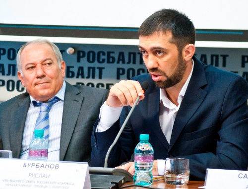 Ruslan Kurbanov's statement at the press conference dedicated to the detentions of Russian citizens in Azerbaijan. To the left is the president of Federal Lezgin National-Cultural Autonomy (FLNCA) Arif Kerimov. Moscow, press center "Rosbalt", August 15, 2013. Photo: http://flnka.ru/ Ruslan Kurbanov's statement at the press conference dedicated to the detentions of Russian citizens in Azerbaijan. To the left is the president of Federal Lezgin National-Cultural Autonomy (FLNCA) Arif Kerimov. Moscow, press center "Rosbalt", August 15, 2013. Photo: http://flnka.ru/