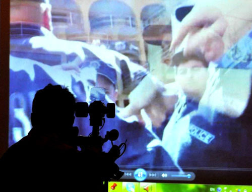Journalist with video camera. Photo: http://www.ekhokavkaza.com/ (RFE/RL) Journalist with video camera. Photo: http://www.ekhokavkaza.com/ (RFE/RL)
