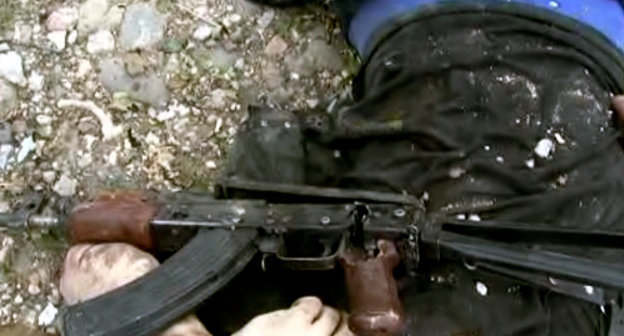 A person killed during the special operation in Buynaksk, August 20, 2013. Photo: http://nac.gov.ru A person killed during the special operation in Buynaksk, August 20, 2013. Photo: http://nac.gov.ru