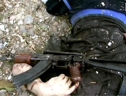 A person killed during the special operation in Buynaksk, August 20, 2013. Photo: http://nac.gov.ru A person killed during the special operation in Buynaksk, August 20, 2013. Photo: http://nac.gov.ru