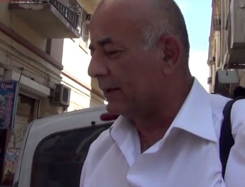 Advocate Ramiz Mamedov near the Baku Court of Grave Crimes after the court hearing of case against Hilal Mamedov. September 11, 2013. Shot of a video report by the channel Obyektiv TV Advocate Ramiz Mamedov near the Baku Court of Grave Crimes after the court hearing of case against Hilal Mamedov. September 11, 2013. Shot of a video report by the channel Obyektiv TV
