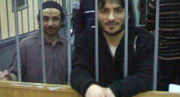 Defendants in case of attack on Nalchik in the courtroom. Rasul Kudaev is in the centre. Photo: http://www.echo.msk.ru/blog/kavkaz_politic/850563-echo/ Defendants in case of attack on Nalchik in the courtroom. Rasul Kudaev is in the centre. Photo: http://www.echo.msk.ru/blog/kavkaz_politic/850563-echo/